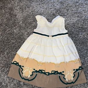 Adorable cow girl design with gold belt detail